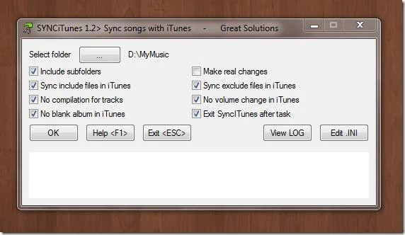 Sincronizza automaticamente i brani nella cartella Musica con iTunes